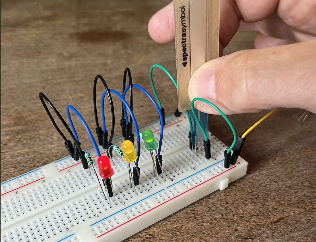 LEDs in series with a sensor in the circuit