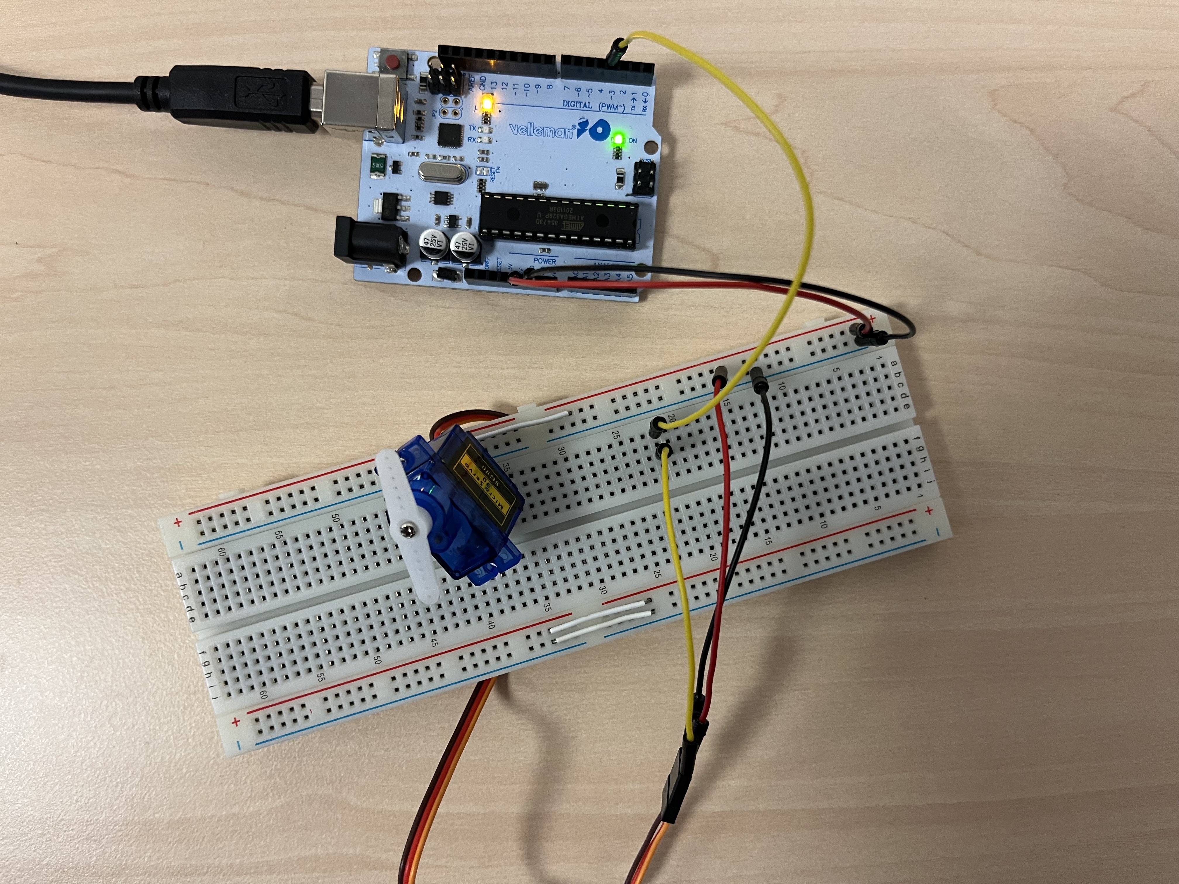 The servo motor connected to the breadboard